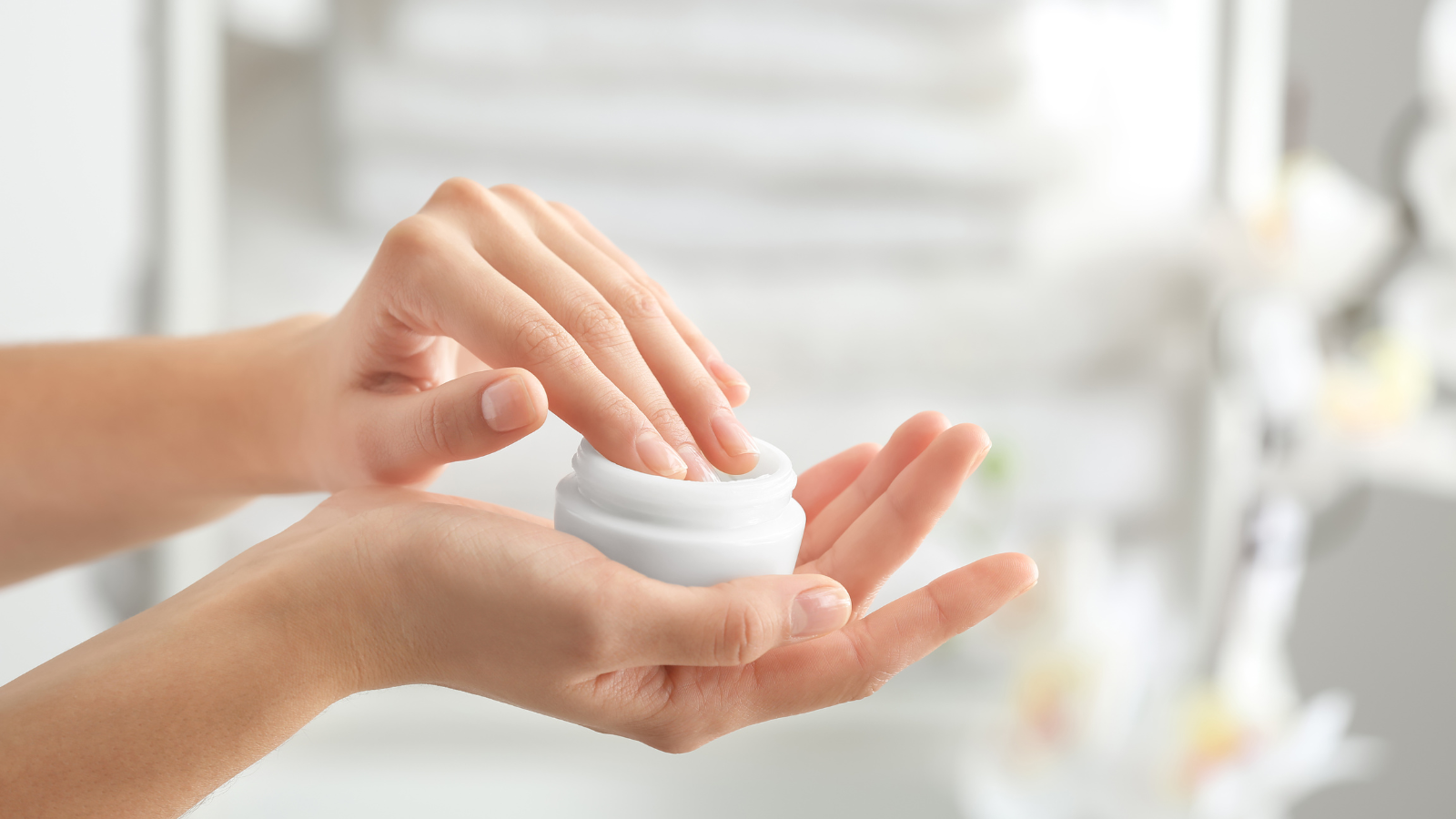 person using a moisturizing cream with lanolin, a common allergen